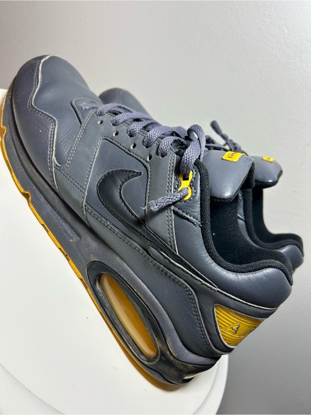 Nike Men's Gray Sneakers with Yellow Accents